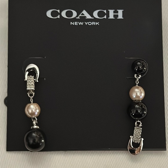 Coach Jewelry - Coach silver dangly earrings with black and pink pearls